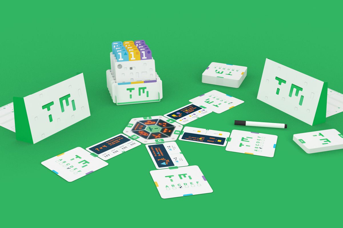 Punchcards and other custom tiles along with a dry erase marker are the basic components of The Turing Machine, a game about punch card computers. Accent colors are green, and the game sits on a green background.