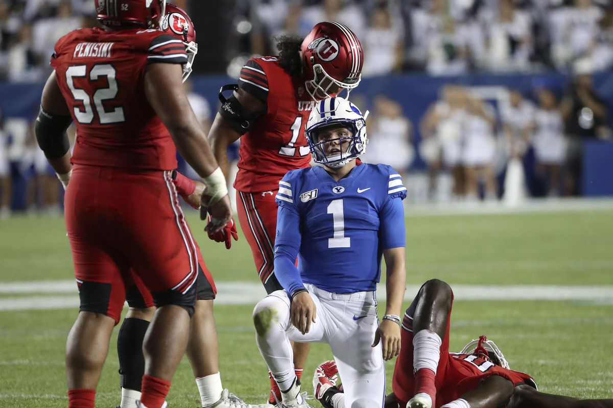 Brigham Young Cougars quarterback Zach Wilson shrugs after a snap sailed over his head on a two-point conversion try during second half action in the University of Utah at BYU football game at LaVell Edwards Stadium in Provo on Thursday, Aug. 29, 2019.