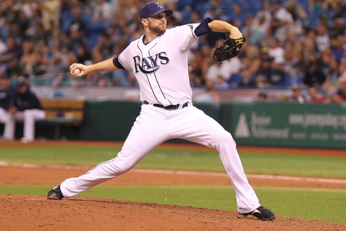 May 28, 2012; St. Petersburg, FL, USA; Tampa Bay Rays relief pitcher Wade Davis (40) throws a pitch against the Chicago White Sox at Tropicana Field. Chicago White Sox defeated the Tampa Bay Rays 2-1. Mandatory Credit: Kim Klement-US PRESSWIRE