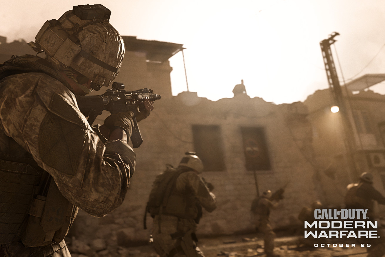 Promotional image from Call of Duty: Modern Warfare featuring a soldier in fatigues and helmet aiming a gun as a squad of soldiers patrol a bomb-out city street
