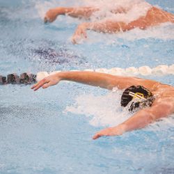 Davis’ Luke Deller swims in men’s 100-yard butterfly at the 6A Swimming State Championships at Brigham Young University in Provo on Saturday, Feb. 19, 2022.