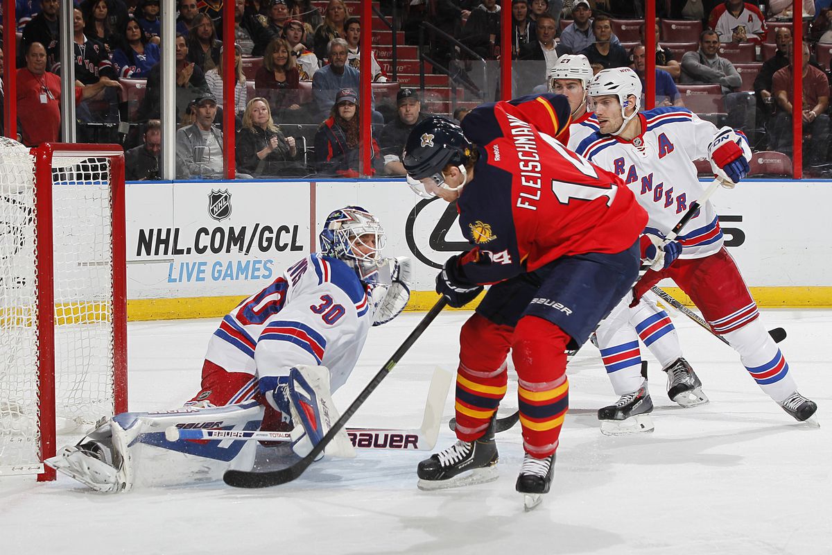 Henrik Lundqvist made 21 stops to lead the Rangers to a shootout win over the Cats.