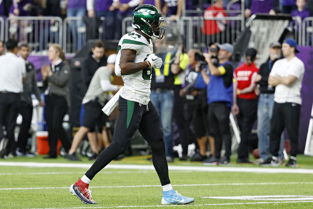 Corey Davis #84 of the New York Jets celebrates after a catch during the fourth quarter against the Minnesota Vikings at U.S. Bank Stadium on December 04, 2022 in Minneapolis, Minnesota.