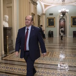 Sen. Chris Coons, D-Del., arrives at the Capitol in Washington, Wednesday, Nov. 14, 2018, as he and Sen. Jeff Flake, R-Ariz., prepare to call for a floor vote on legislation to protect Special Counsel Robert Mueller in the wake of former Attorney General Jeff Sessions's forced resignation by President Donald Trump and replacing him with Matthew Whitaker, a Trump loyalist. (AP Photo/J. Scott Applewhite)