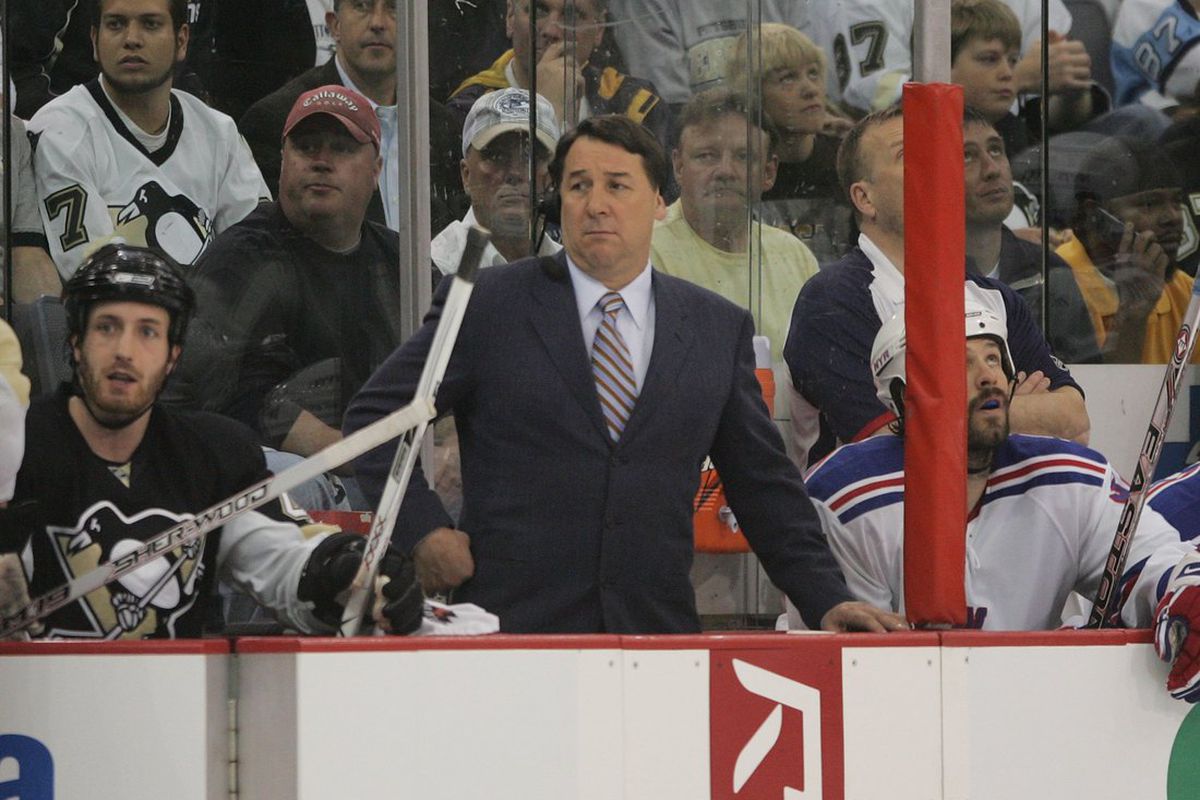 Mike Milbury, former Boston Bruins great and current analyst for the Versus Network, has been charged with assault and battery on a 12-year-old, according to reports. (Getty Images)