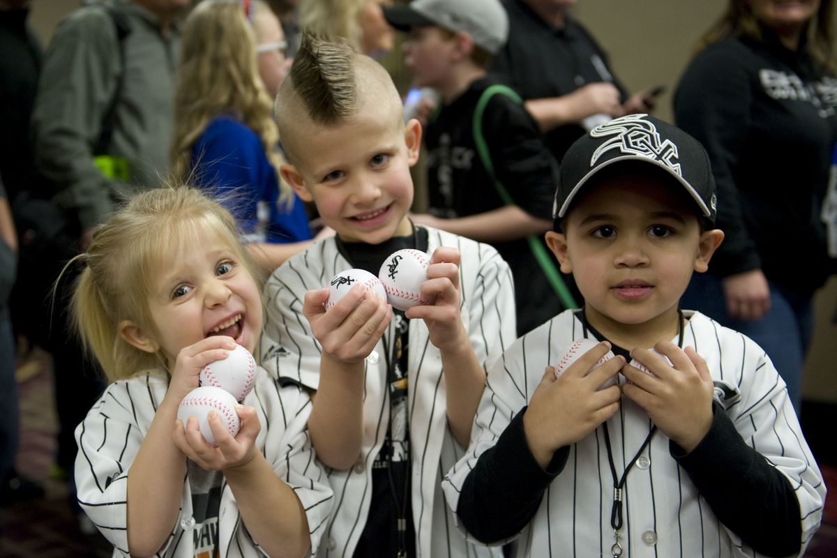 Lily Shure, 4, and her brother Ethan, 6 of Hoffman Estates, join Andre Jacques, 4 of Itasca on opening day of SoxFest 2015. Concerns about the coronavirus pandemic have prompted the White Sox to cancel SoxFest 2021.