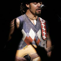 Michael Franti performs at Wednesday's fund-raiser. Money was raised for U. scholarships and Calvary Baptist's youth mentoring.