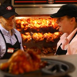 Anderson Gets Instructions From A Fellow Boston Market Employee