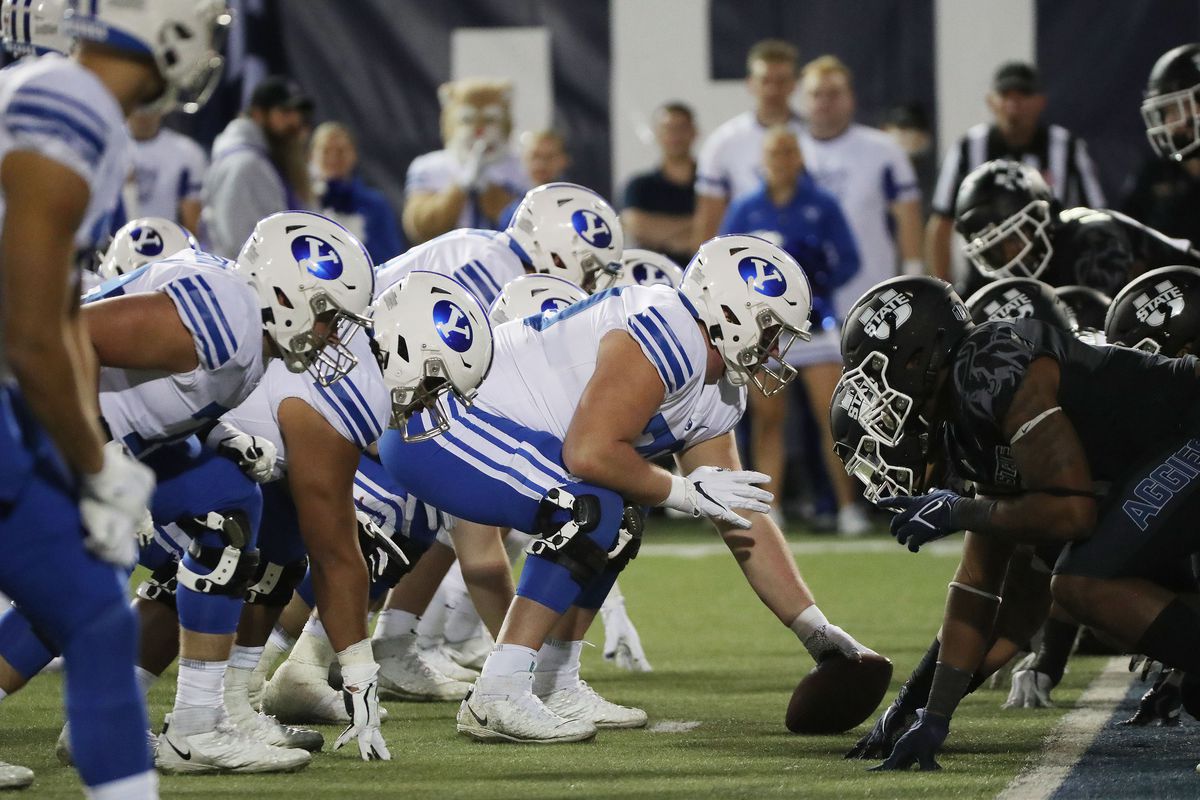BYU and Utah State line up during a game in Logan on Friday, Oct. 1, 2021. Both teams can hit the 11-win mark with bowl wins.