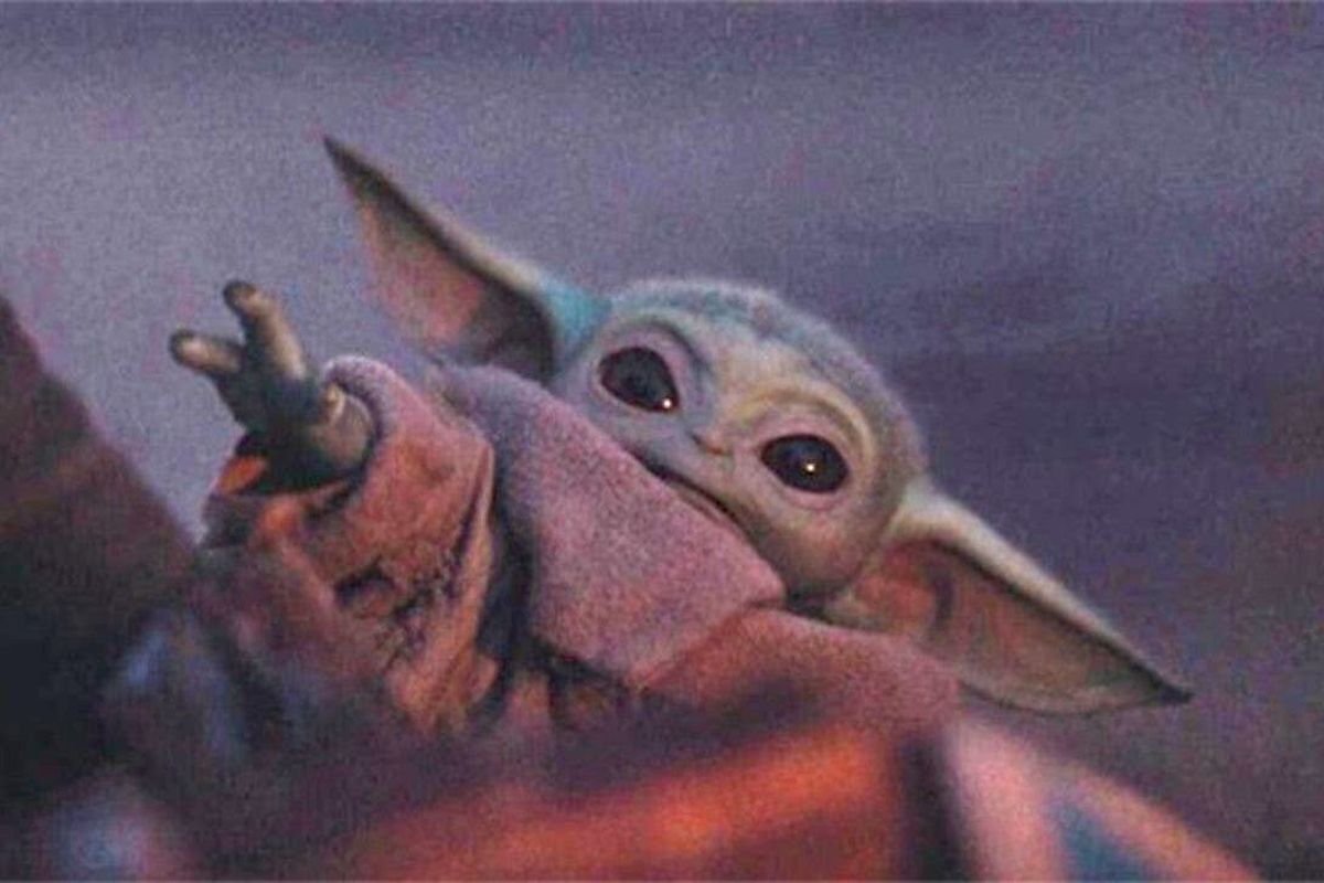 Baby Yoda reaching out with his wee little hand