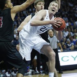 Brigham Young Cougars forward Kyle Davis (21) drives on Santa Clara Broncos guard Jarvis Pugh (4) during the WCC tournament in Las Vegas Saturday, March 5, 2016. 