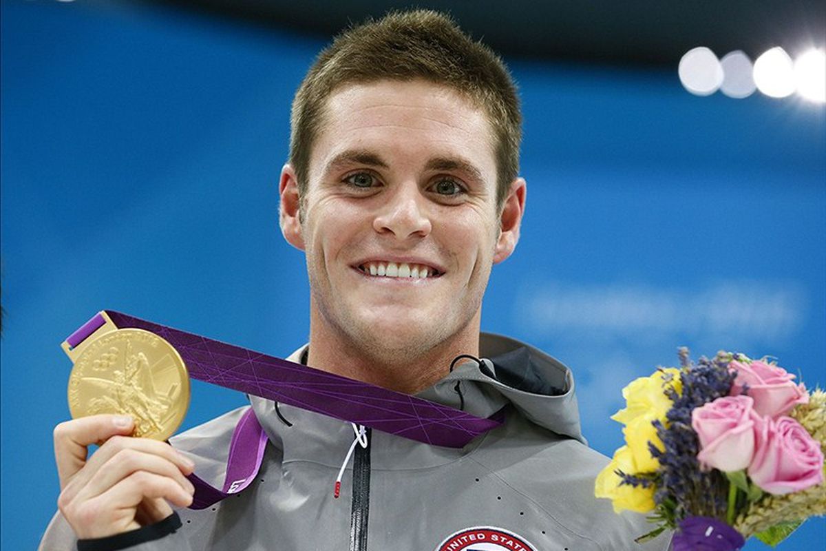 David Boudia (USA) celebrates with his gold medal in men's 10m.  (Photo by: Rob Schumacher-USA TODAY Sports