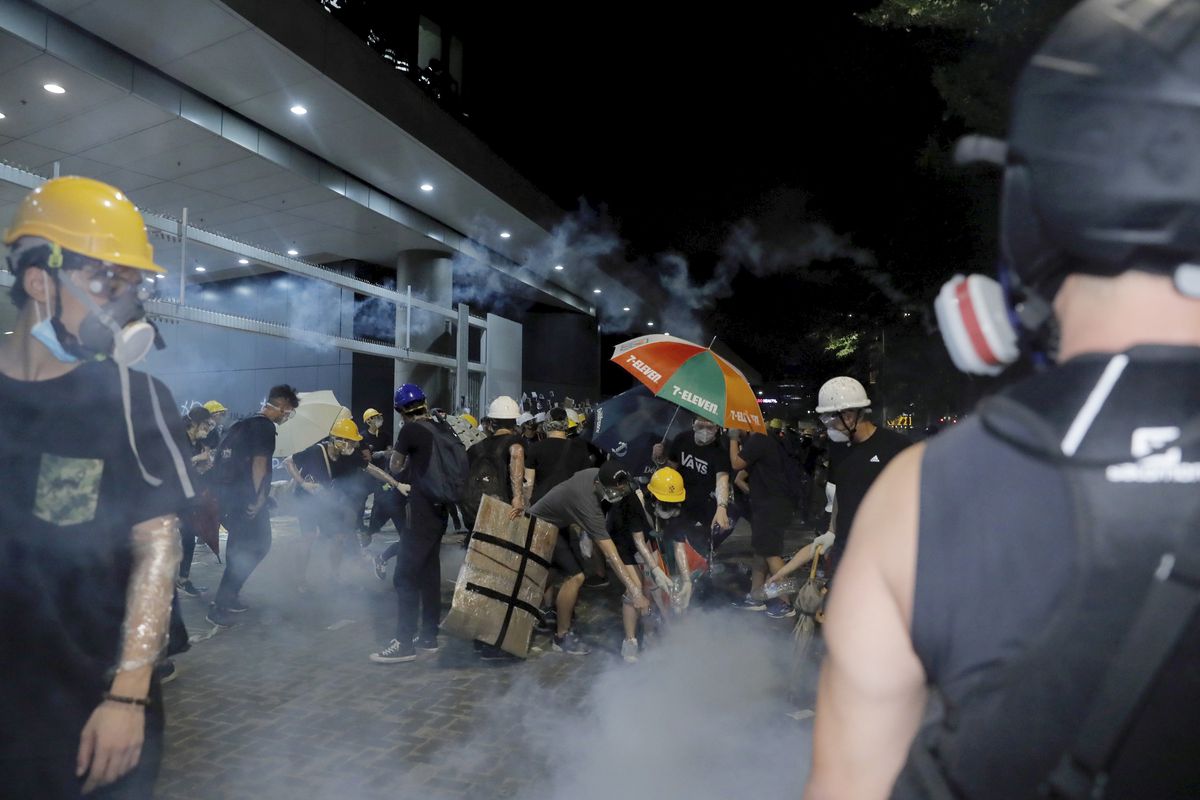 Clouds of tear gas can be seen outside the legislative building on July 2, 2019.
