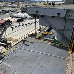 The USS Abraham Lincoln’s (CVN-72) No. 1 elevator sits in the down position.