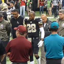 Keenan Lewis helped off the field by trainers