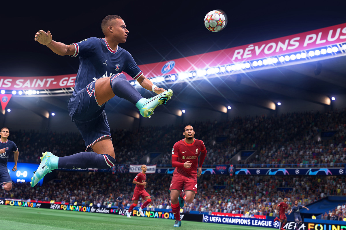 World superstar Kylian Mbappe of Paris-St. Germain makes a midair volley with his right foot extended.