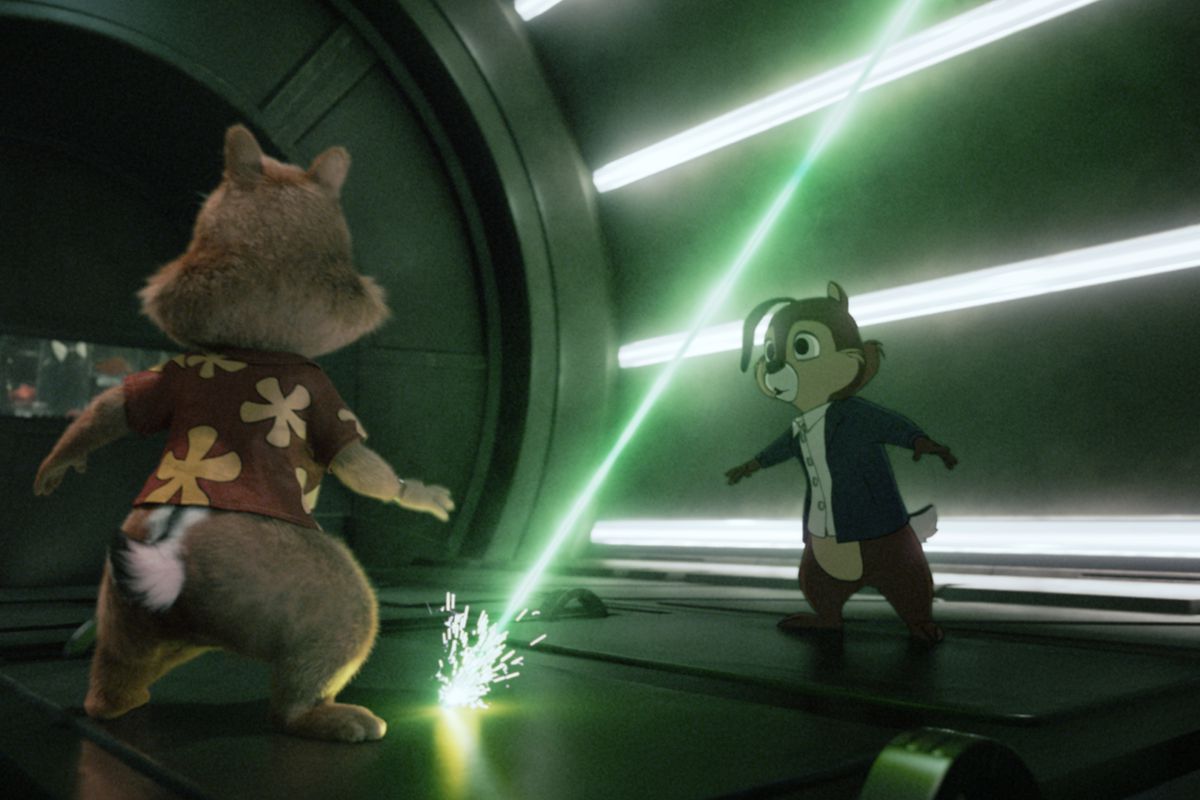 chip and dale inside of a machine with a giant green laser