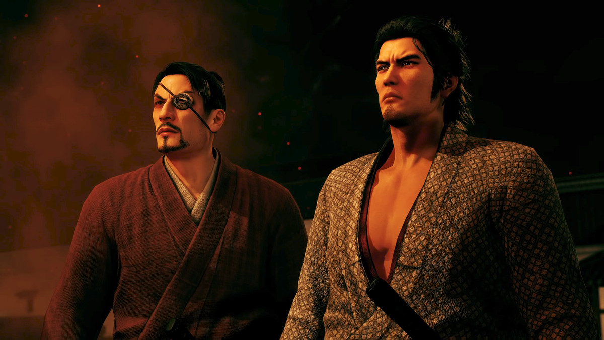 Series regulars Kazuma Kiryu and Goro Majima, as historical figures, stand beside each other in front of a fire at night in Like a Dragon: Ishin!