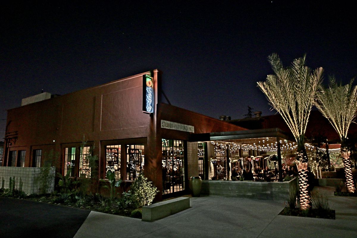 David Chang restaurant Majordomo in Los Angeles, CA, after dark and lit from within