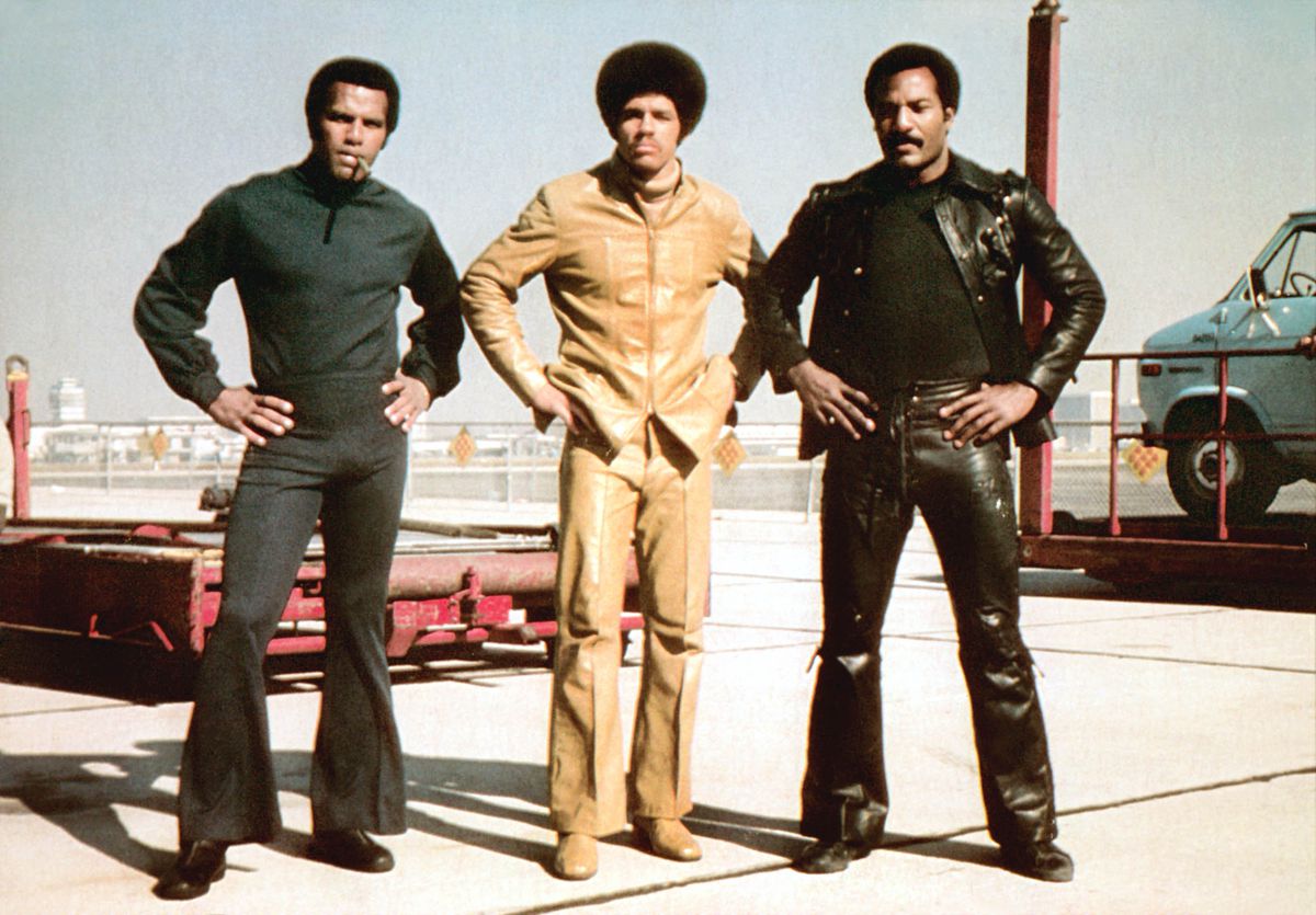 Jim Kelly, Fred Williamson, and Jim Brown look extremely cool and hold their hands on their hips in Three the Hard Way.