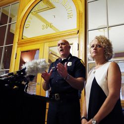 FILE - Salt Lake City Mayor Jackie Biskupski, right, listens as Police Chief Mike Brown speaks during a press conference at the City-County Building in Salt Lake City on Friday, Sept. 1, 2017, concerning a University Hospital nurse who was arrested for not allowing a blood draw by a Salt Lake police officer.