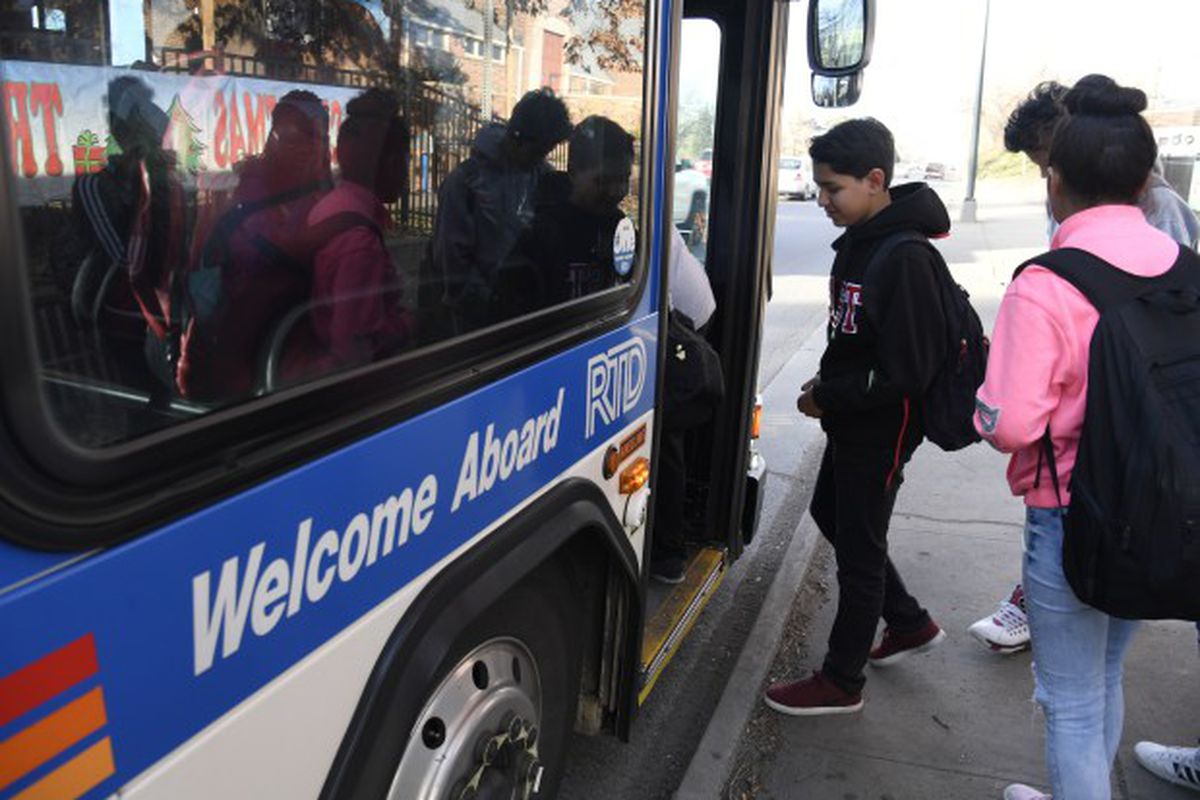 High schoolers in Denver take public buses to school.