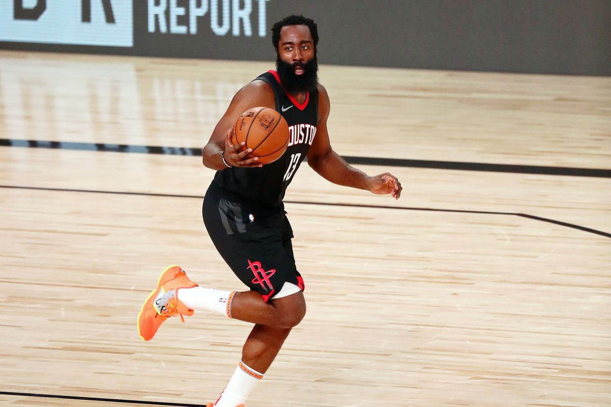 James Harden of the Houston Rockets brings the ball up court against the Los Angeles Lakers in the second half at The Arena at ESPN Wide World Of Sports Complex on August 6, 2020 in Lake Buena Vista, Florida.&nbsp;