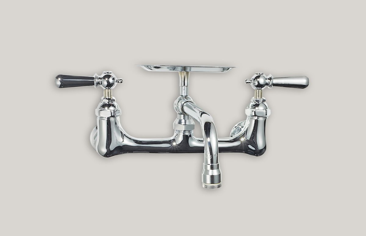 Stainless steel faucet with soap holder