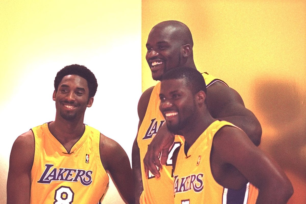 016777.SP.1002.Lakers20.VC A couple of newcomers join a couple of starters for a group portrait duri