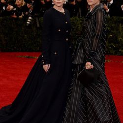 Mary-Kate in vintage Ferre and Ashley Olsen in vintage Chanel