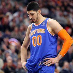 Former Utah Jazz player and current New York Knicks center Enes Kanter (00) looks at the ground during a basketball game against the Utah Jazz at the Vivint Smart Home Arena in Salt Lake City on Friday, Jan. 19, 2018.
