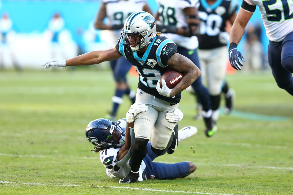 Carolina Panthers wide receiver D.J. Moore gets tackled after a reception in the fourth quarter against the Seattle Seahawks at Bank of America Stadium