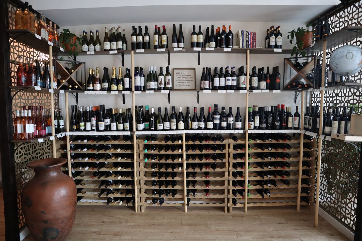 A wall of wine at Era Wine Bar.
