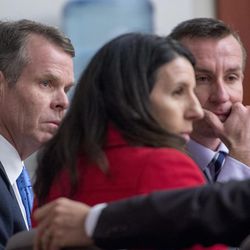 Former Utah Attorney General John Swallow, left, listens as members of his defense team discuss how to correct an error in jury instructions as he waits for a verdict in his trial at the Matheson Courthouse in Salt Lake City on Thursday, March 2, 2017.