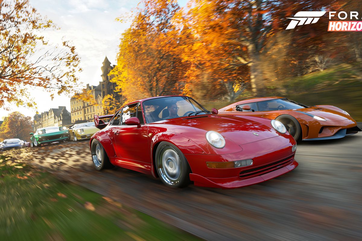 Forza Horizon 4 - cars racing past trees in autumn
