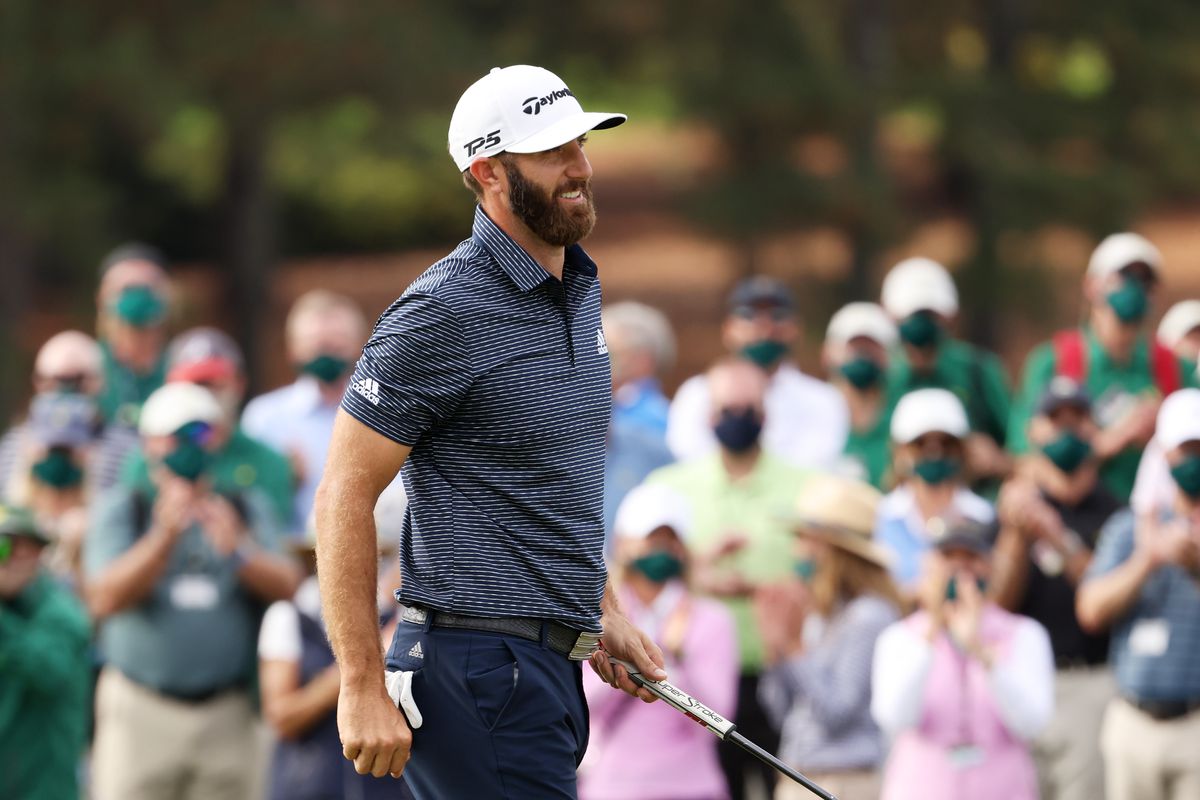 Dustin Johnson reacts on the 18th green Sunday after winning the Masters at Augusta National Golf Club in Augusta, Ga.