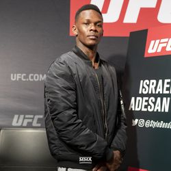 Israel Adesanya poses at UFC 230 media day.