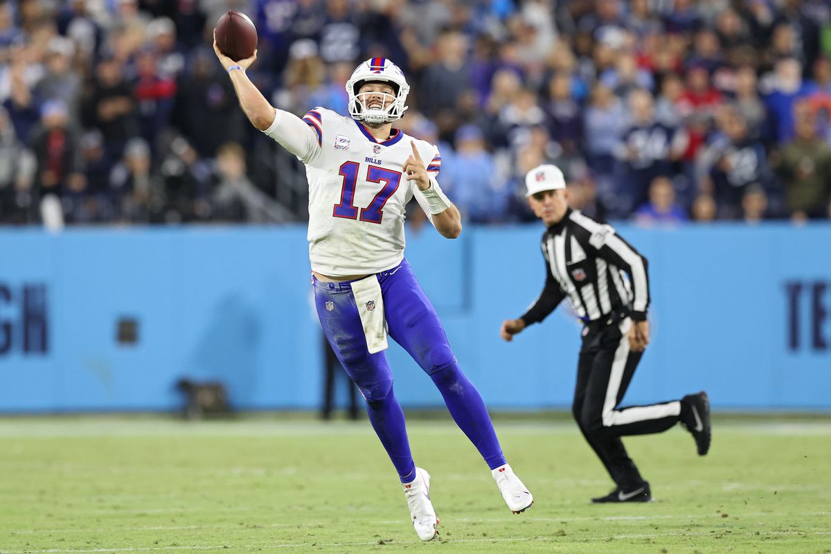 Quarterback Josh Allen #17 of the Buffalo Bills throws a touchdown pass to teammate wide receiver Cole Beasley #11 (not pictured) against the Tennessee Titans during the second quarter at Nissan Stadium on October 18, 2021 in Nashville, Tennessee.