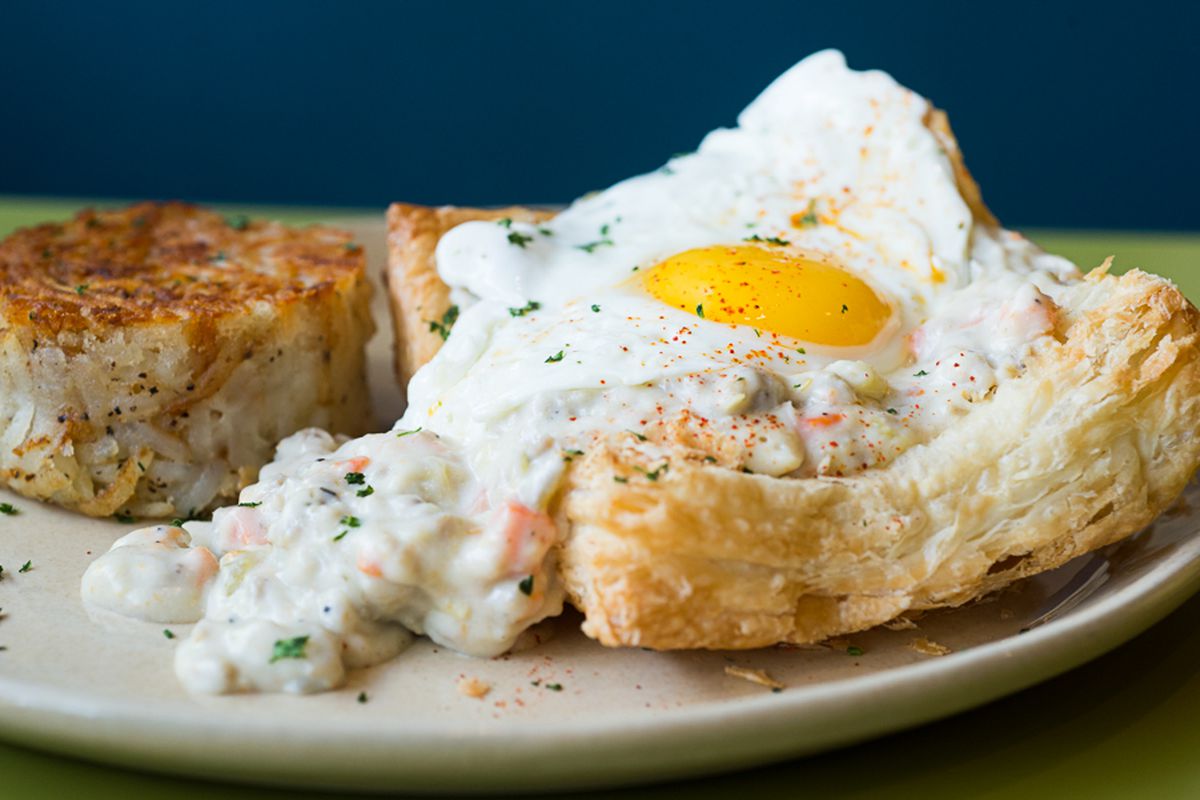 Snooze’s breakfast pot pie, topped with a fried egg