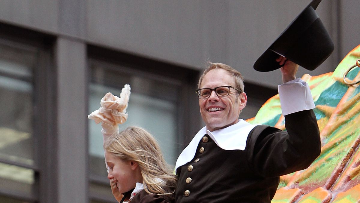 NEW YORK - NOVEMBER 25:  Food Network personality Alton Brown (R) attends the 84th Annual Macy's Thanksgiving Day Parade on November 25, 2010 in New York City.  (Photo by Taylor Hill/FilmMagic)