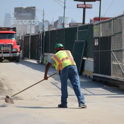 Thu 3:13 p.m. Sweeping at the Waveland/Clark work gate - 