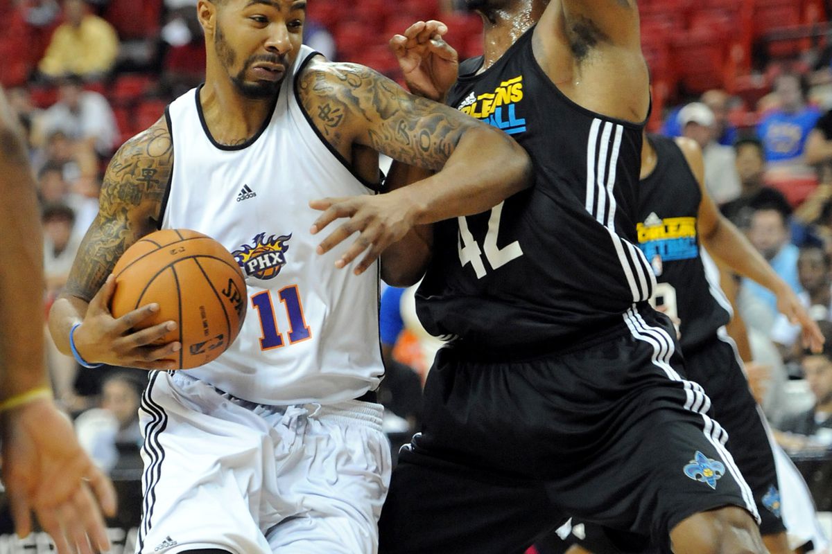 July 18, 2012; Las Vegas, NV, USA;  New Orleans Hornets forward Lance Thomas (42) defends against Phoenix Suns forward Markieff Morris (11) during the first half of the game at Thomas & Mack Center. Mandatory Credit: Jayne Kamin-Oncea-US PRESSWIRE