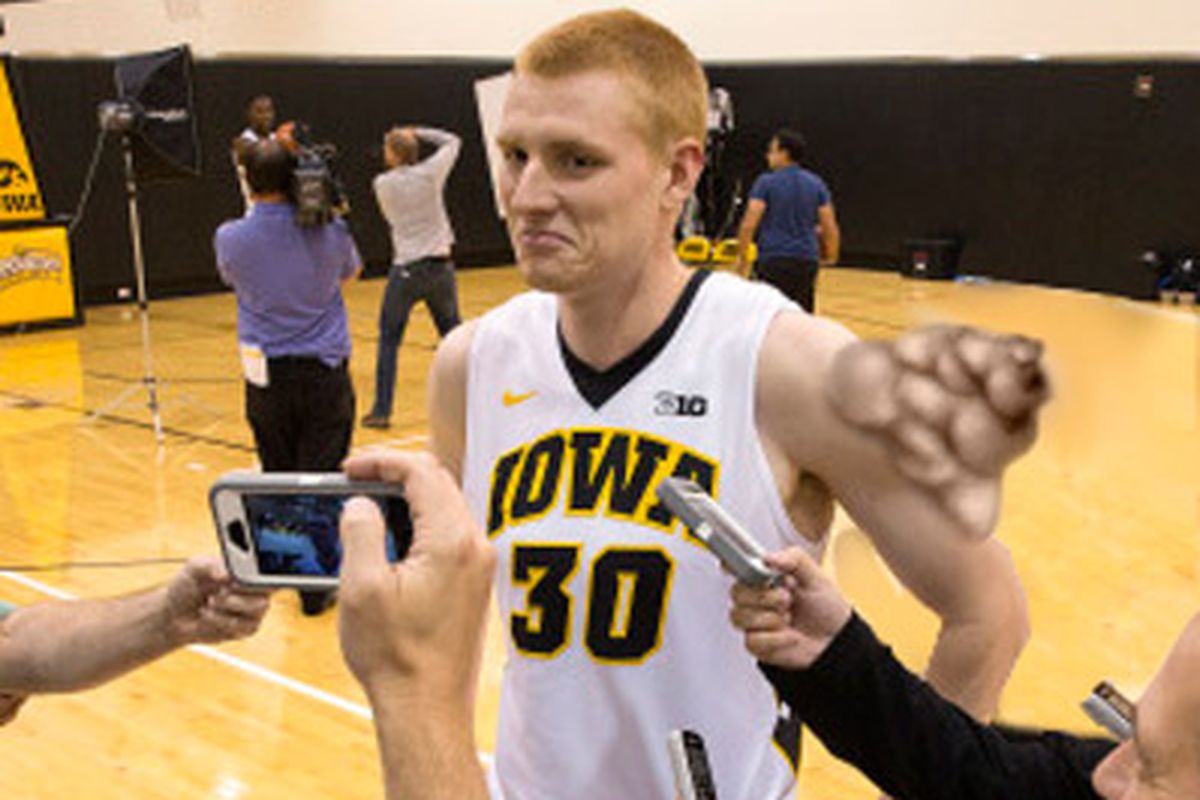 White shows off his added muscle at Iowa's media day