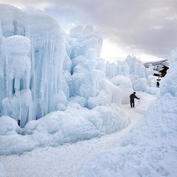 Brent Christensen's gigantic ice castles stand in Midway. Tourists may walk through for $2.  