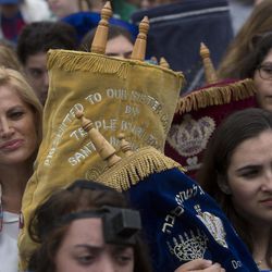 Women hold Torah scrolls as they pray at the Western Wall, the holiest site where Jews can pray in Jerusalem's Old City, Wednesday, Nov. 2, 2016. Leaders of liberal Jewish movements in the U.S. and Israel have demonstrated for equal prayer at a Jewish holy site, despite a plea from Israel's prime minister not to push the matter publicly. 