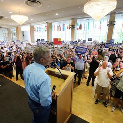 Libertarian presidential candidate Gov. Gary Johnson acknowledges the cheers of supporters as he and running mate Gov. Bill Weld talk at the University of Utah in Salt Lake City on Saturday, Aug. 6, 2016.