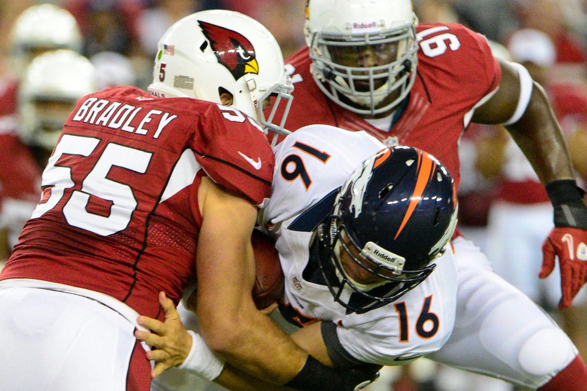 Broncos quarterback Caleb Hanie (16) is sacked by Arizona Cardinals linebacker Stewart Bradley (55)