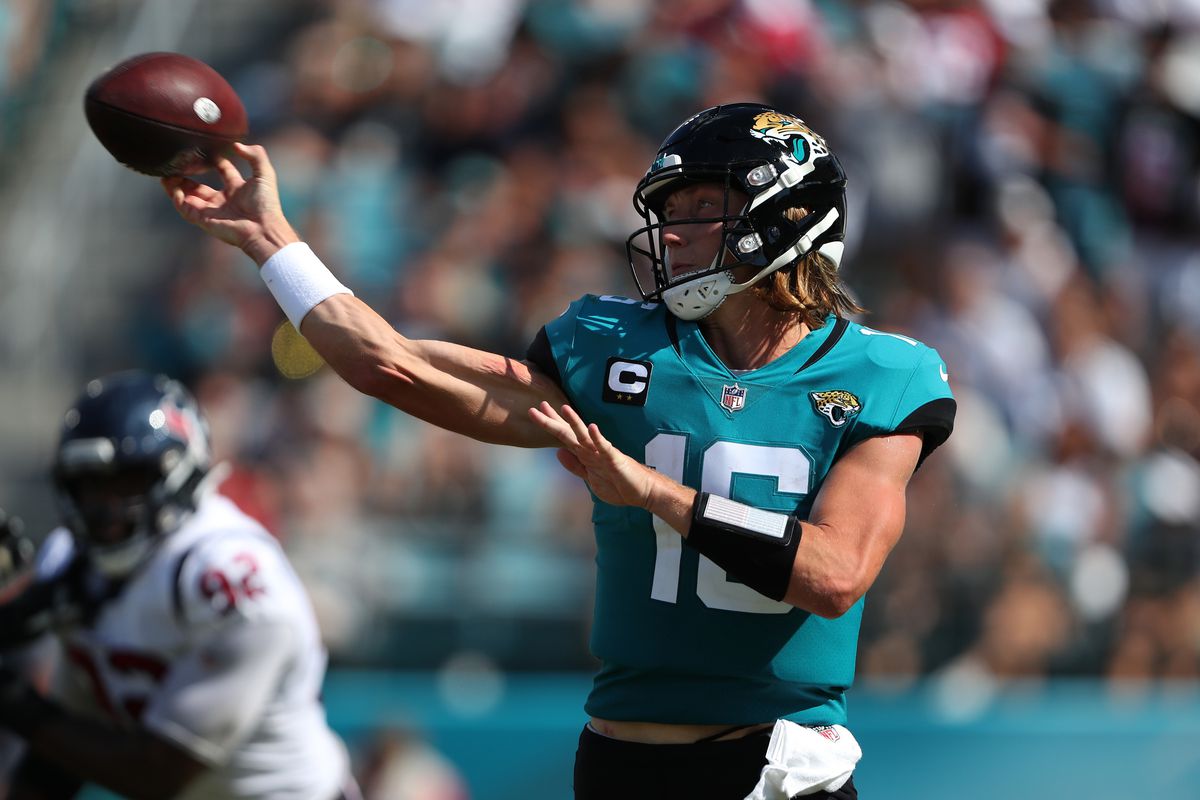 JACKSONVILLE, FLORIDA - OCTOBER 09: Trevor Lawrence #16 of the Jacksonville Jaguars throws the ball during the fourth quarter of the game against the Houston Texans at TIAA Bank Field on October 09, 2022 in Jacksonville, Florida.