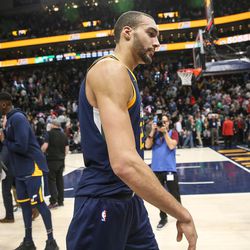 Utah Jazz center Rudy Gobert (27) leaves the court after losing 97-94 to the Boston Celtics at Vivint Smart Home Arena in Salt Lake City on Wednesday, March 28, 2018.