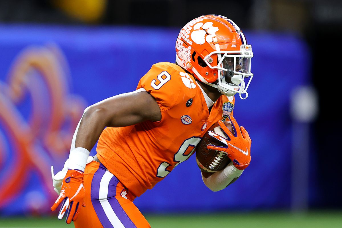 Travis Etienne #9 of the Clemson Tigers receives the opening kickoff against the Ohio State Buckeyes in the first quarter during the College Football Playoff semifinal game at the Allstate Sugar Bowl at Mercedes-Benz Superdome on January 01, 2021 in New Orleans, Louisiana.